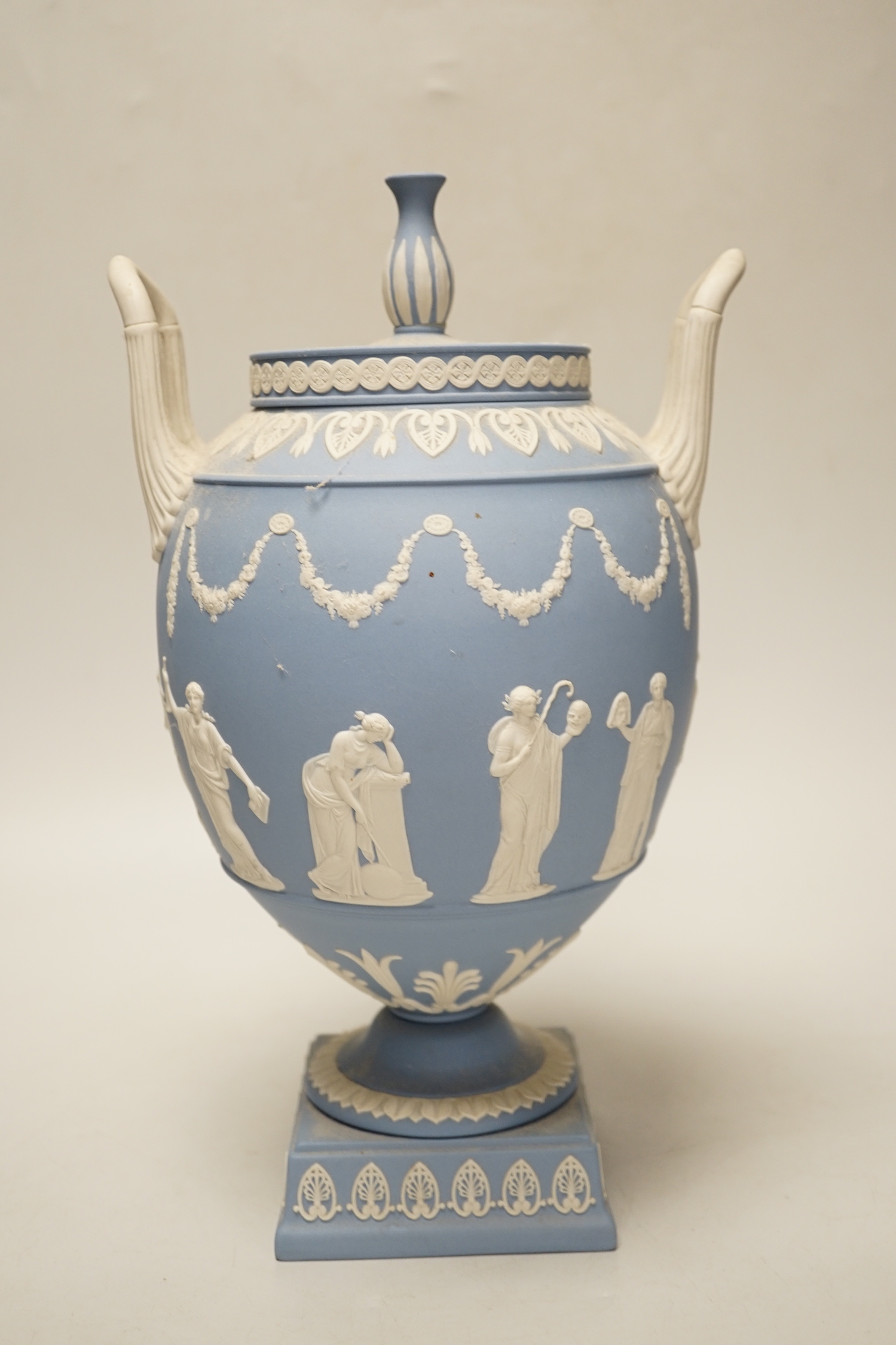 A 20th century Wedgwood blue Jasper two-handled urn and cover, 31cm